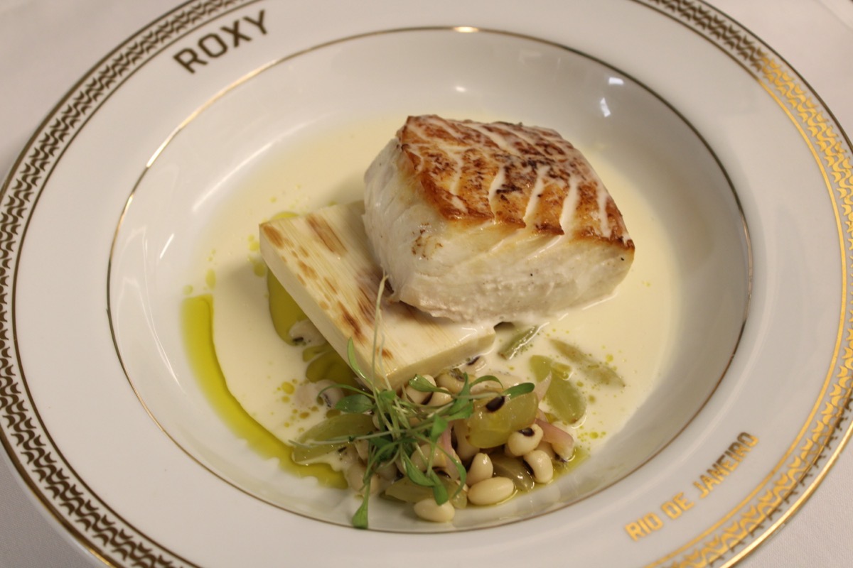 Plated dinner course served on Roxy Rio de Janeiro china